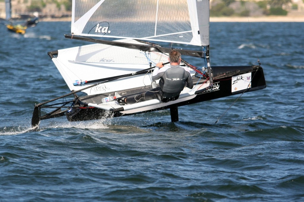 A flick of the mainsheet and the boat breaks free of the water - International Moth Class nationals © Bernie Kaaks - copyright